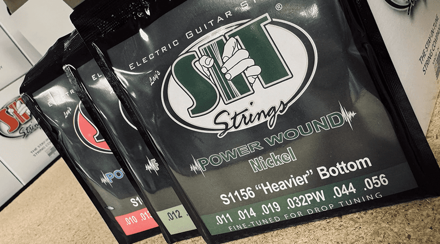 Electric guitar strings of different gauges with the title Best Electric Guitar String Gauges