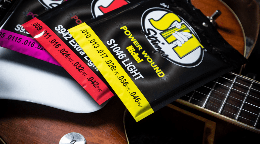 Electric guitar with S.I.T. Power Wound string packs and the title How To Choose Electric Guitar Strings