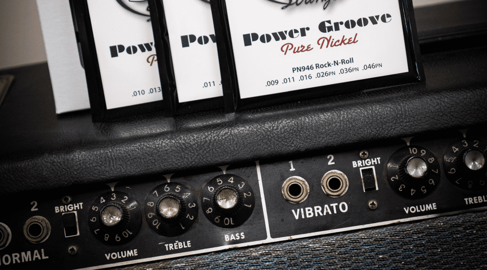 Electric guitar and amplifier with the title How to Improve Your Guitar Tone